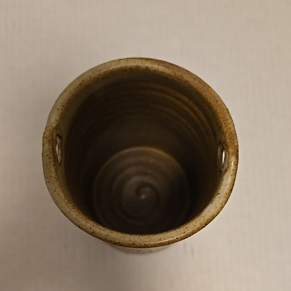Brown Signed Pottery Vase with White Floral Design